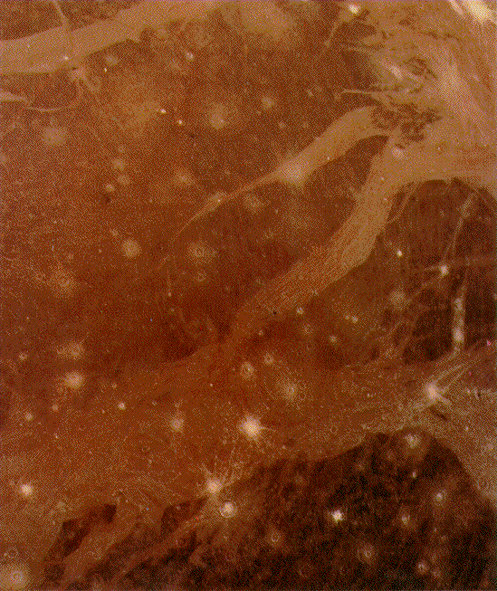 Voyager's Preview of Galileo at Ganymede