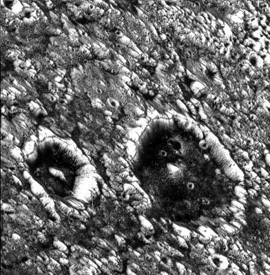 Dark Craters on Ganymede