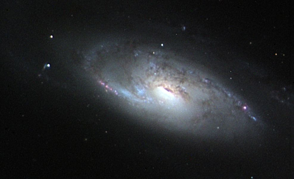 M106: A Spiral Galaxy with a Strange Core