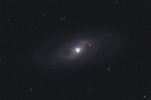 The Einstein Cross Gravitational Lens