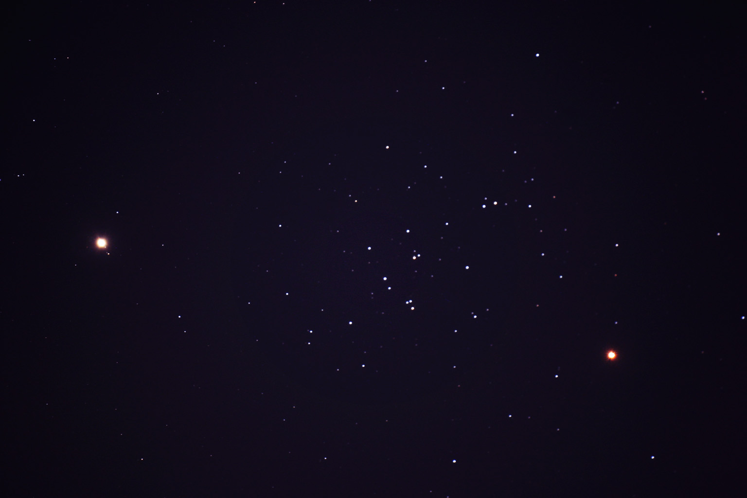 Saturn, Mars, and the Beehive Cluster