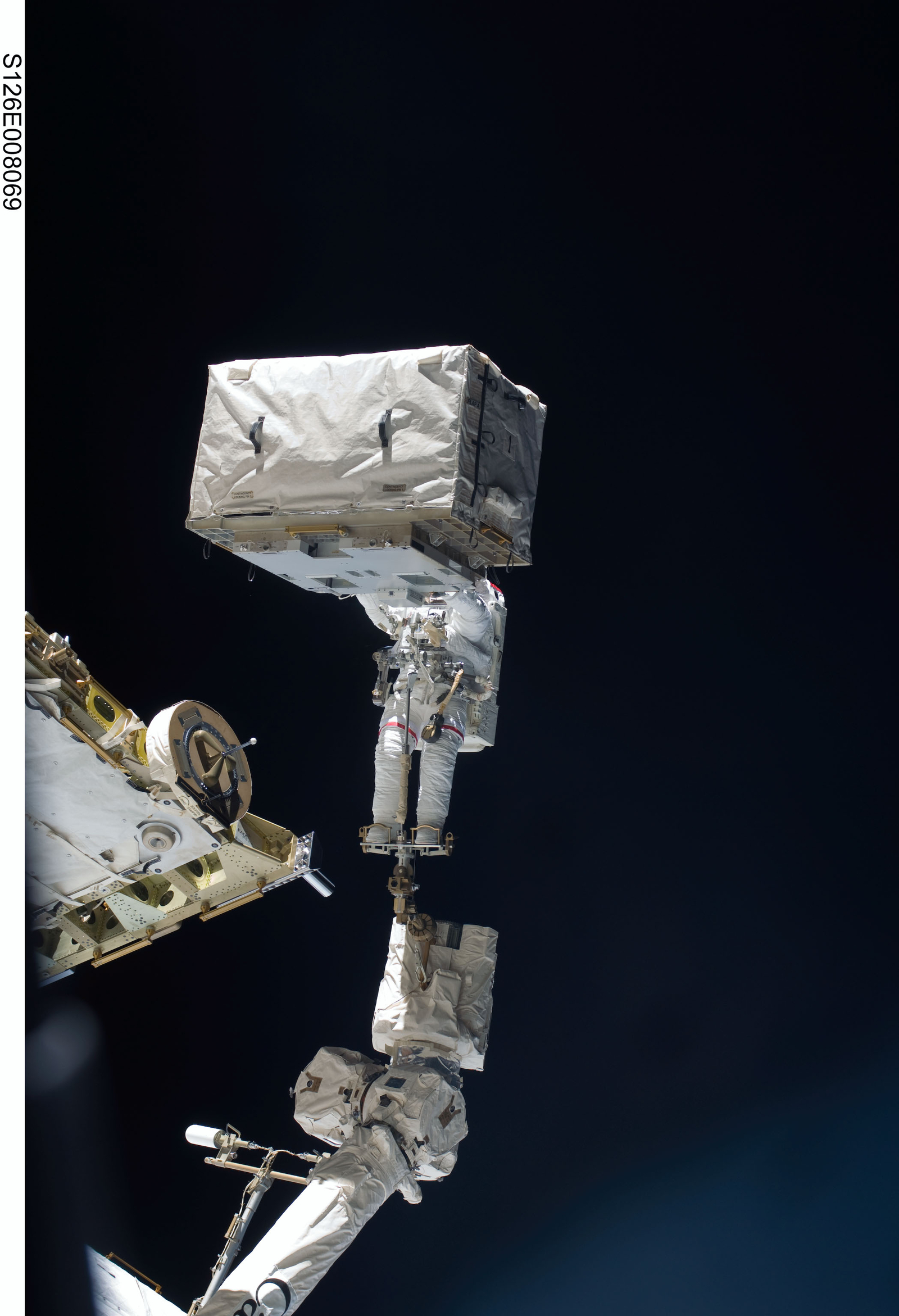 Astronaut's Head Upgraded During Spacewalk