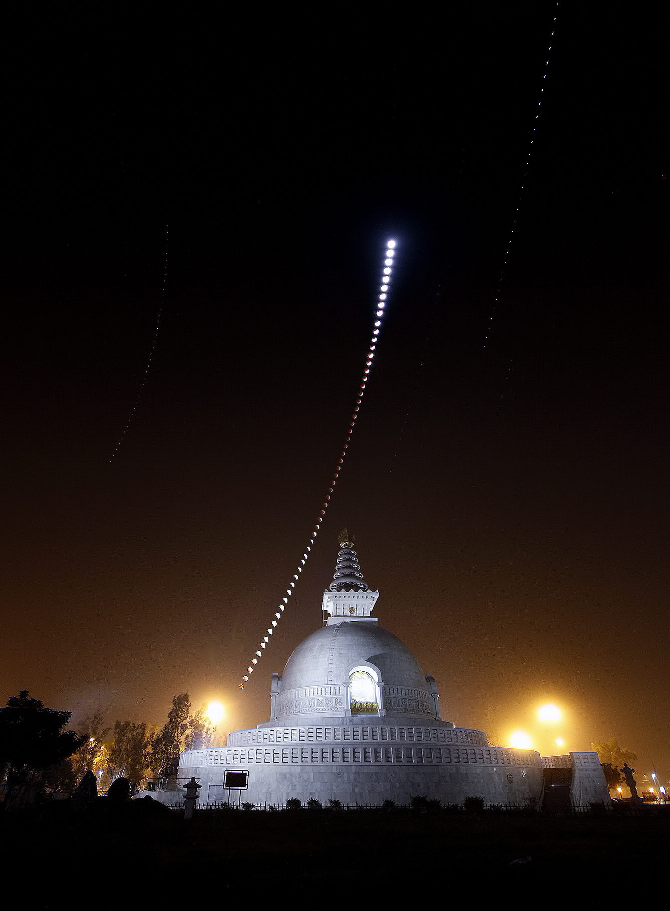 A Lunar Eclipse Over an Indian Peace Pagoda