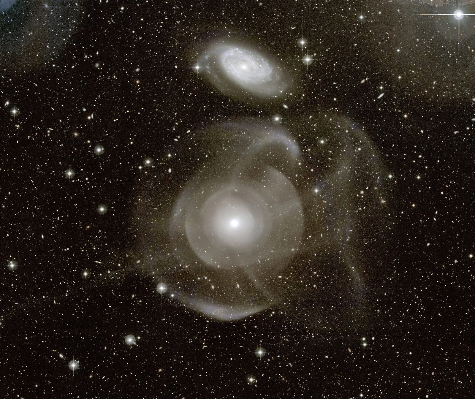 Galaxy NGC 474: Cosmic Blender