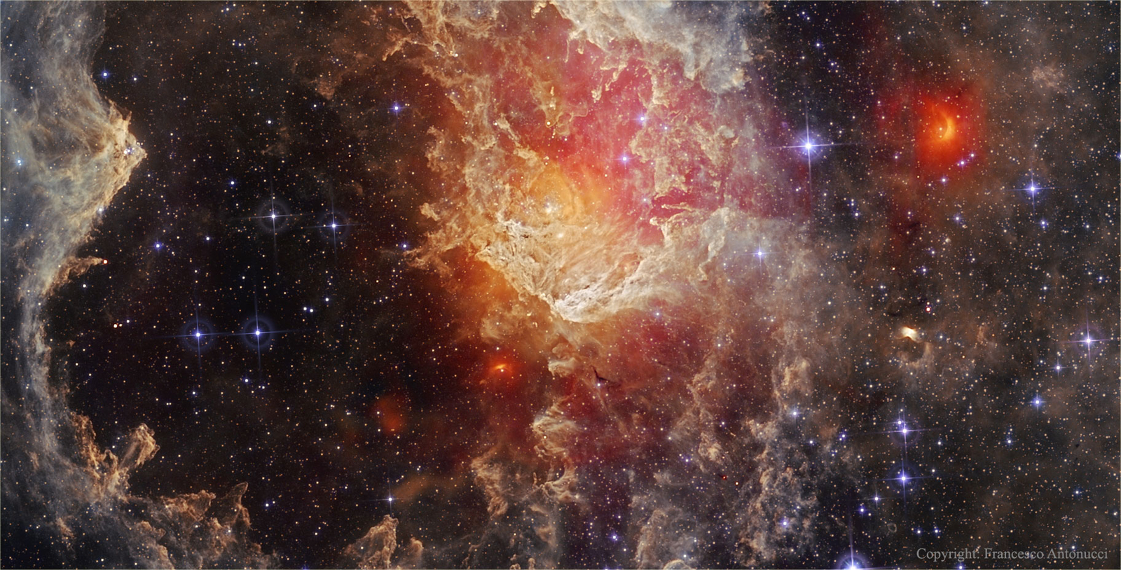 Stars and Dust Pillars in NGC 7822 from WISE