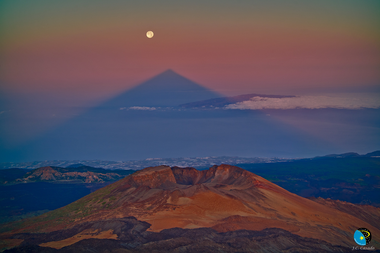 A Triangular Shadow of a Large Volcano