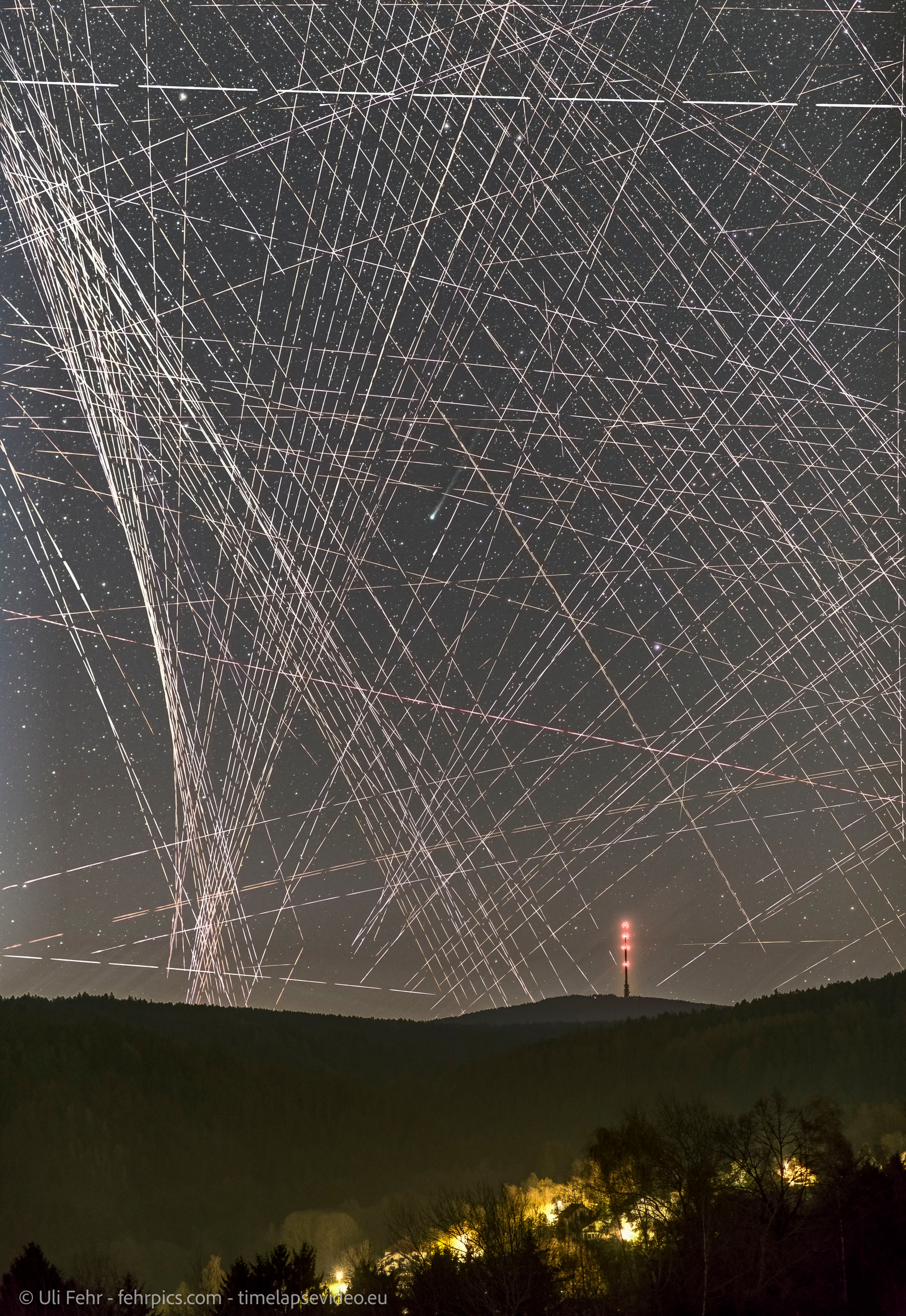 Comet R3 PanSTARRS Behind Satellite Trails