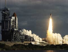 Preview of Columbia Waits, Discovery Launches