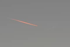 Preview of Jet Approaching a Crescent Moon