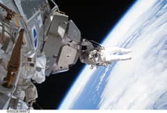 Preview of Astronaut Installs Panoramic Space Window