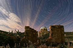 Preview of Illuminated Cloud Trails Above Greece