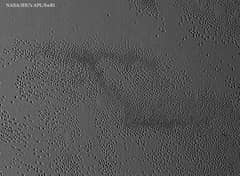 Preview of Unusual Pits Discovered on Pluto