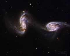 Preview of Arp 240: A Bridge between Spiral Galaxies from Hubble