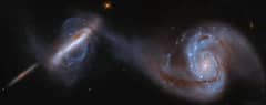 Preview of Arp 87: Merging Galaxies from Hubble