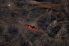 Preview of The Red Glow of the Cosmic Bat Nebula