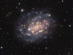 Preview of NGC 300: A Cosmic Gemstone with Stars and Gas Clouds