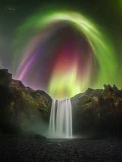 Preview of Colorful Aurora over Icelandic Waterfall