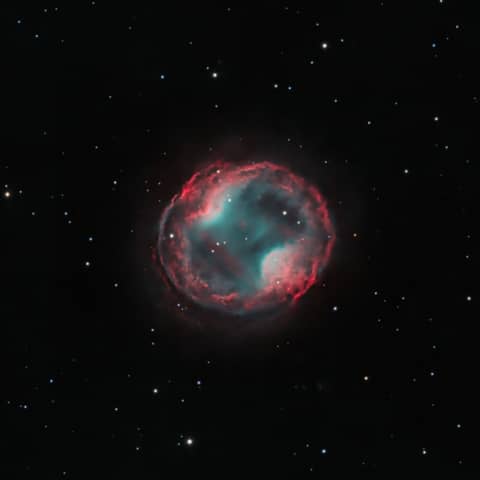 PK 164 +31.1: The Headphone Nebula
