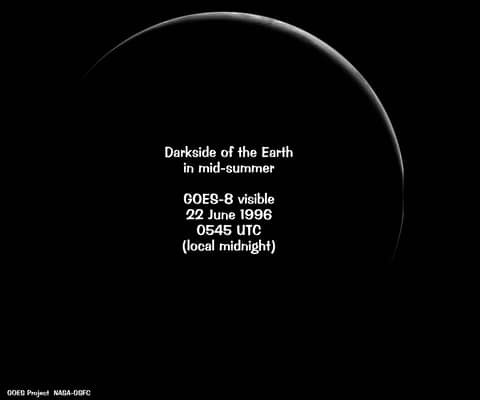 A Crescent Earth At Midnight