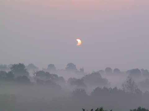 Eclipse in the Mist
