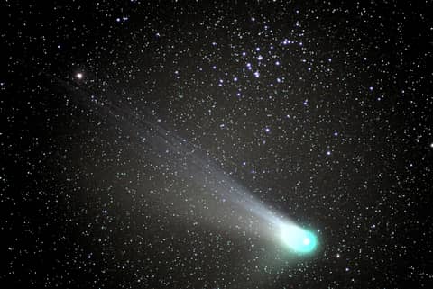 Comet NEAT and the Beehive Cluster