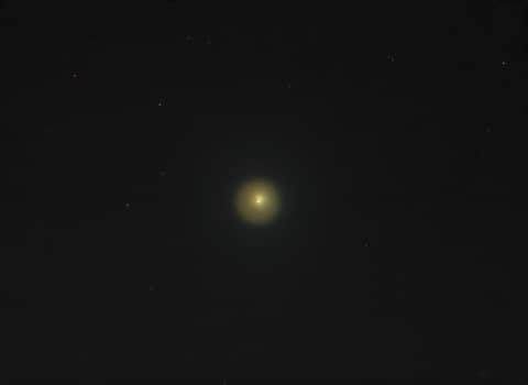 A Telescopic View of Erupting Comet Holmes