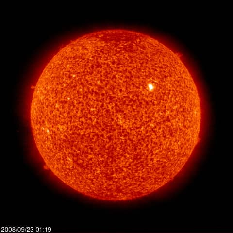 Active Region 1002 on an Unusually Quiet Sun