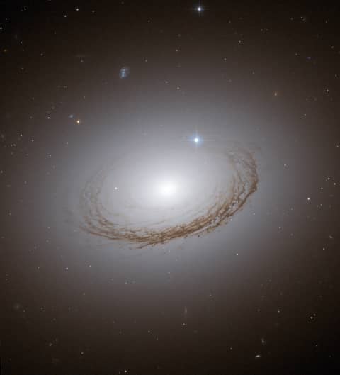 Unusual Dusty Galaxy NGC 7049