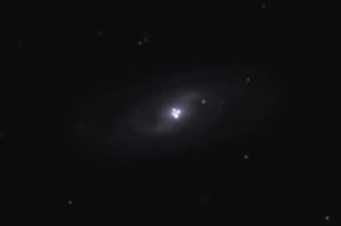The Einstein Cross Gravitational Lens