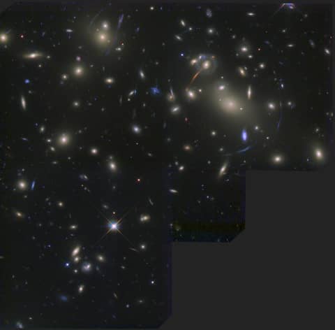 Abell 2218: A Galaxy Cluster Lens
