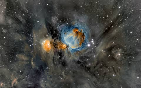 Orion Nebula in Surrounding Dust