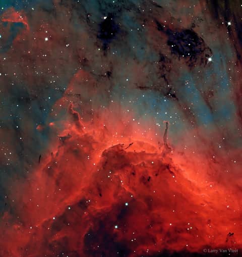 Pillars and Jets in the Pelican Nebula