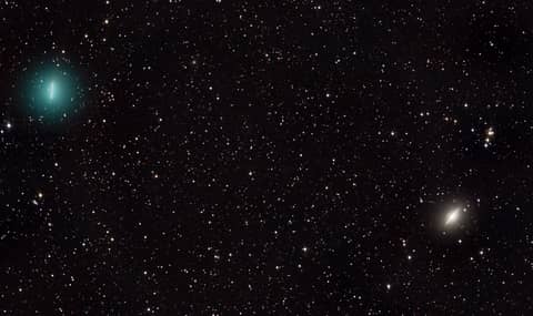 Comet Iwamoto and the Sombrero Galaxy