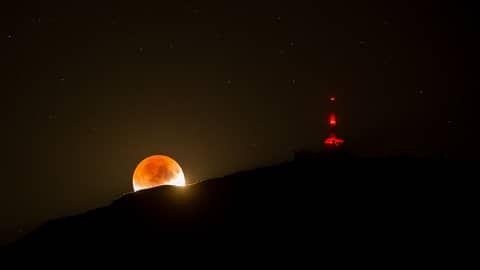 Shadowed Moon and Mountain