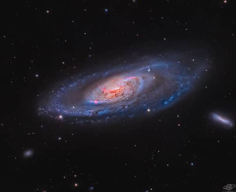 M106: A Spiral Galaxy with a Strange Center