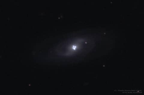 The Einstein Cross Gravitational Lens