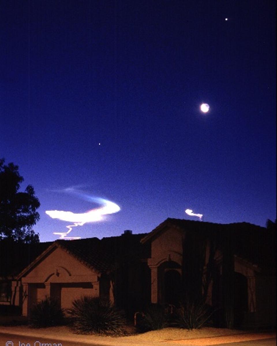 Moon, Planets, and Rocket Trails