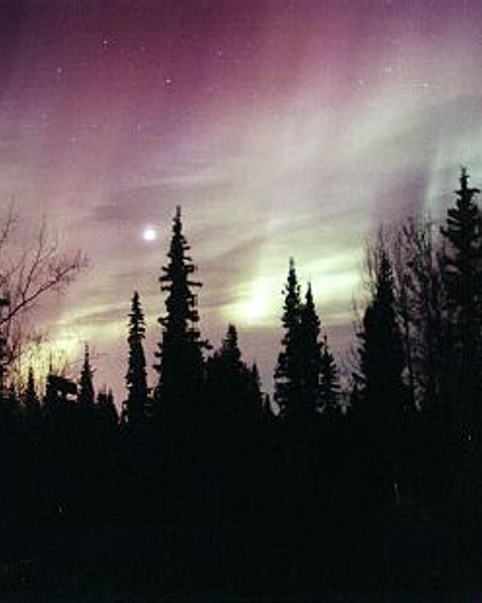 Aurora Through a Moonlit Sky