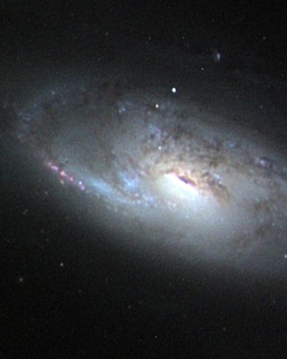 M106: A Spiral Galaxy with a Strange Core