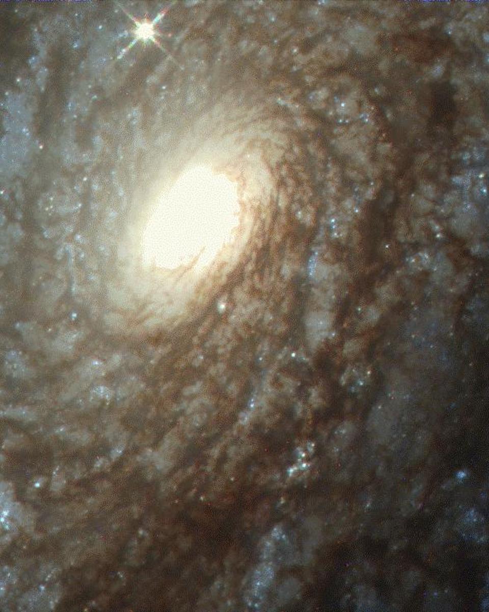 NGC 4414: A Flocculent Spiral Galaxy