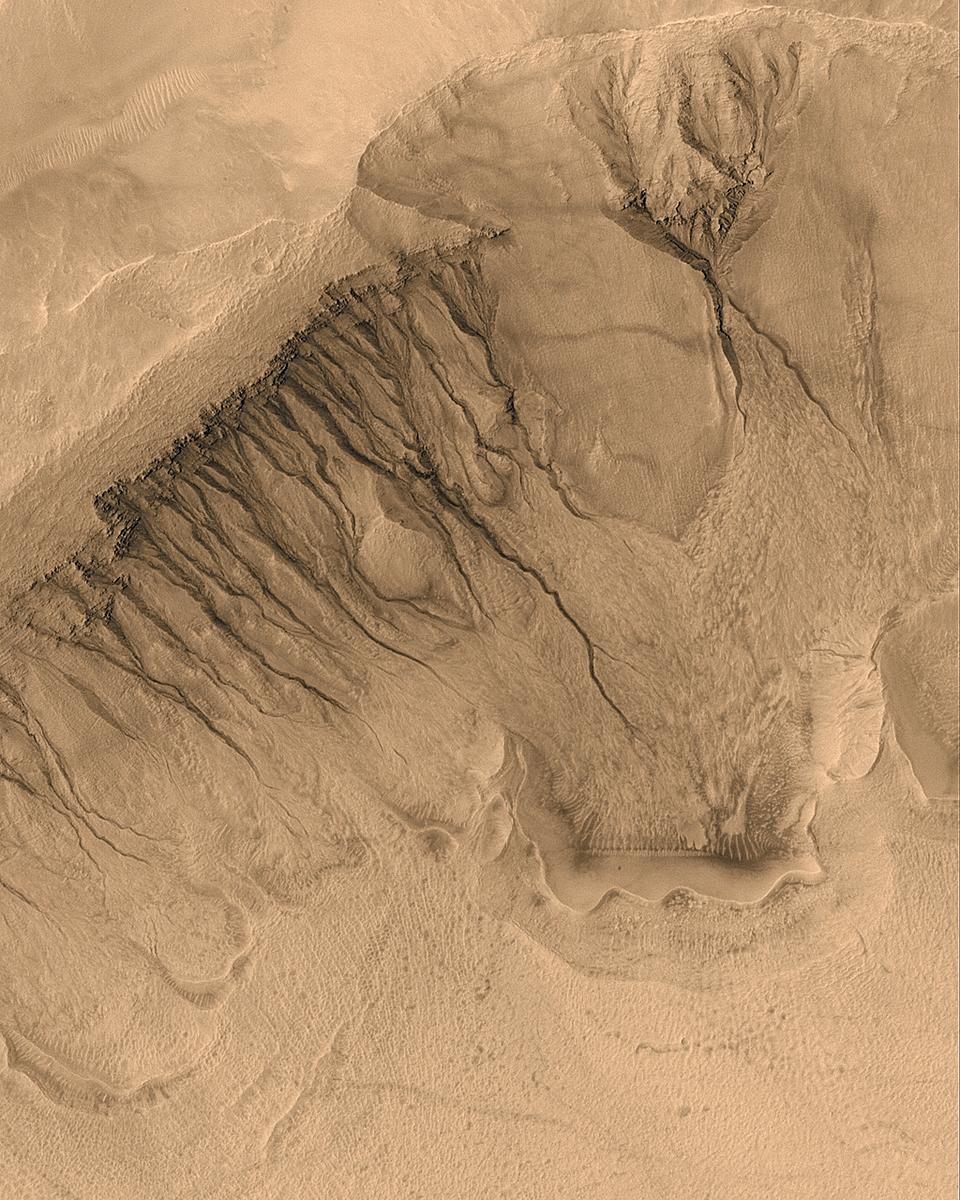 Unusual Gullies and Channels on Mars
