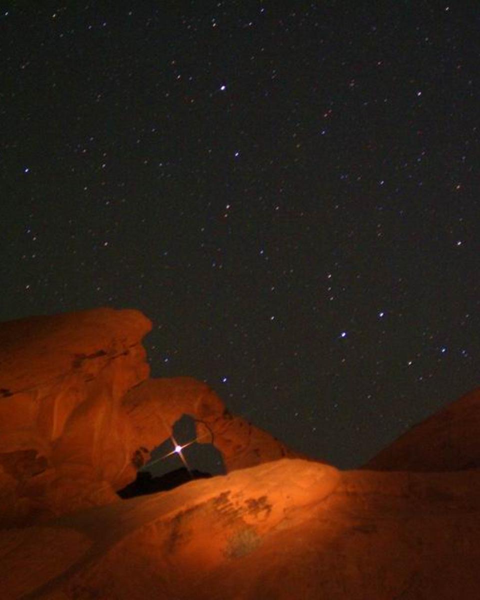 Mars Rising Through Arch Rock