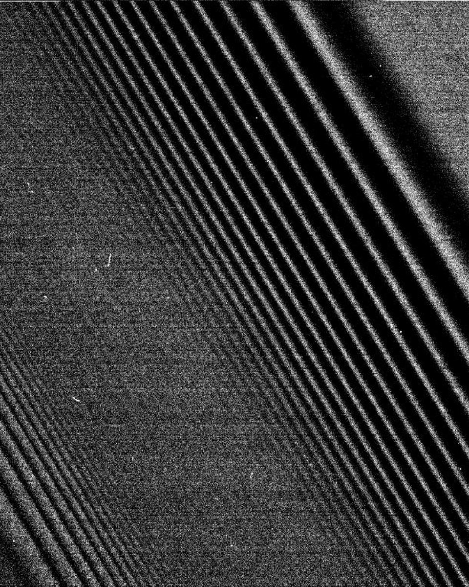 Cassini Images Density Waves in Saturn's Rings