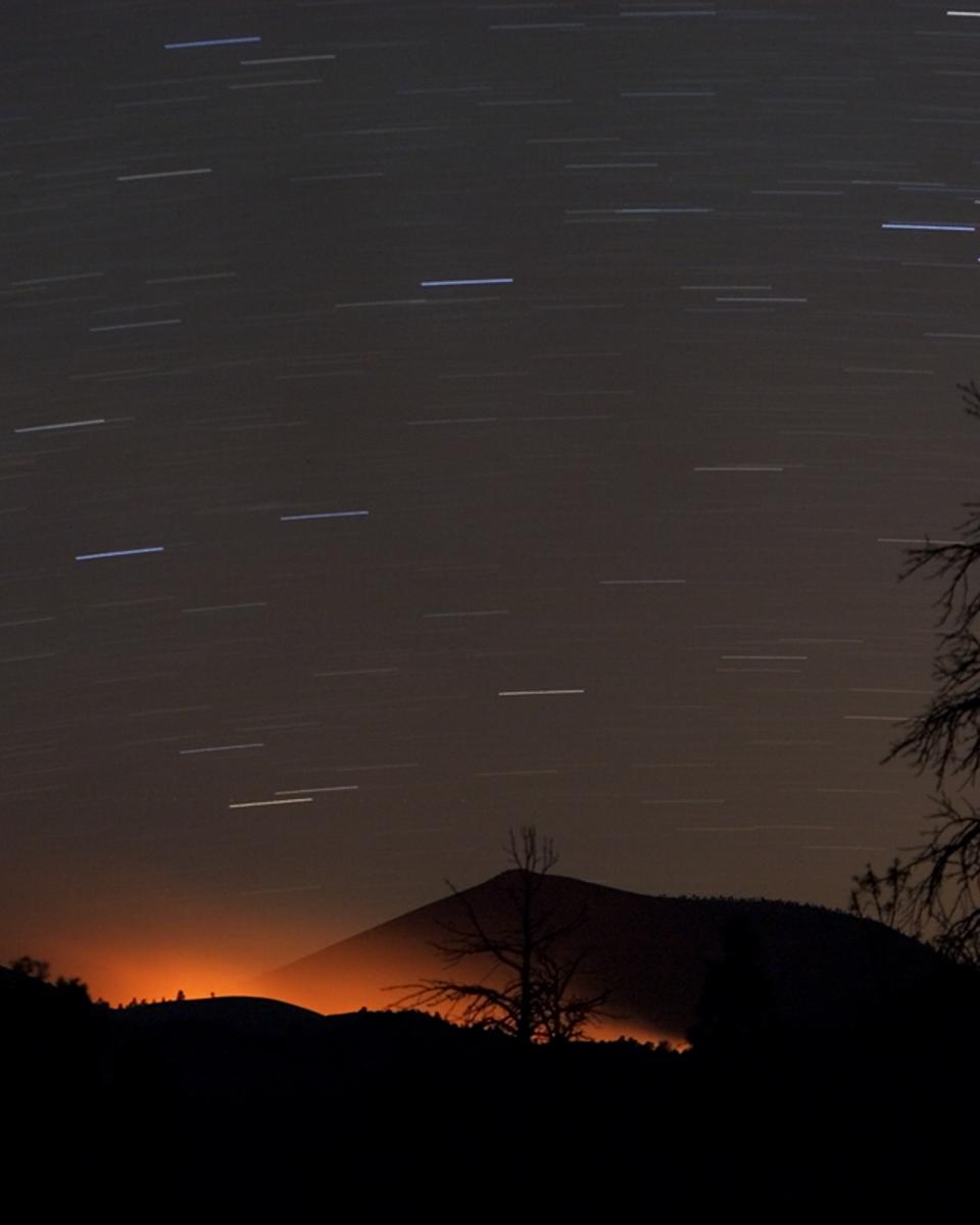 Fire Glow and Star Trails at Sunset Crater
