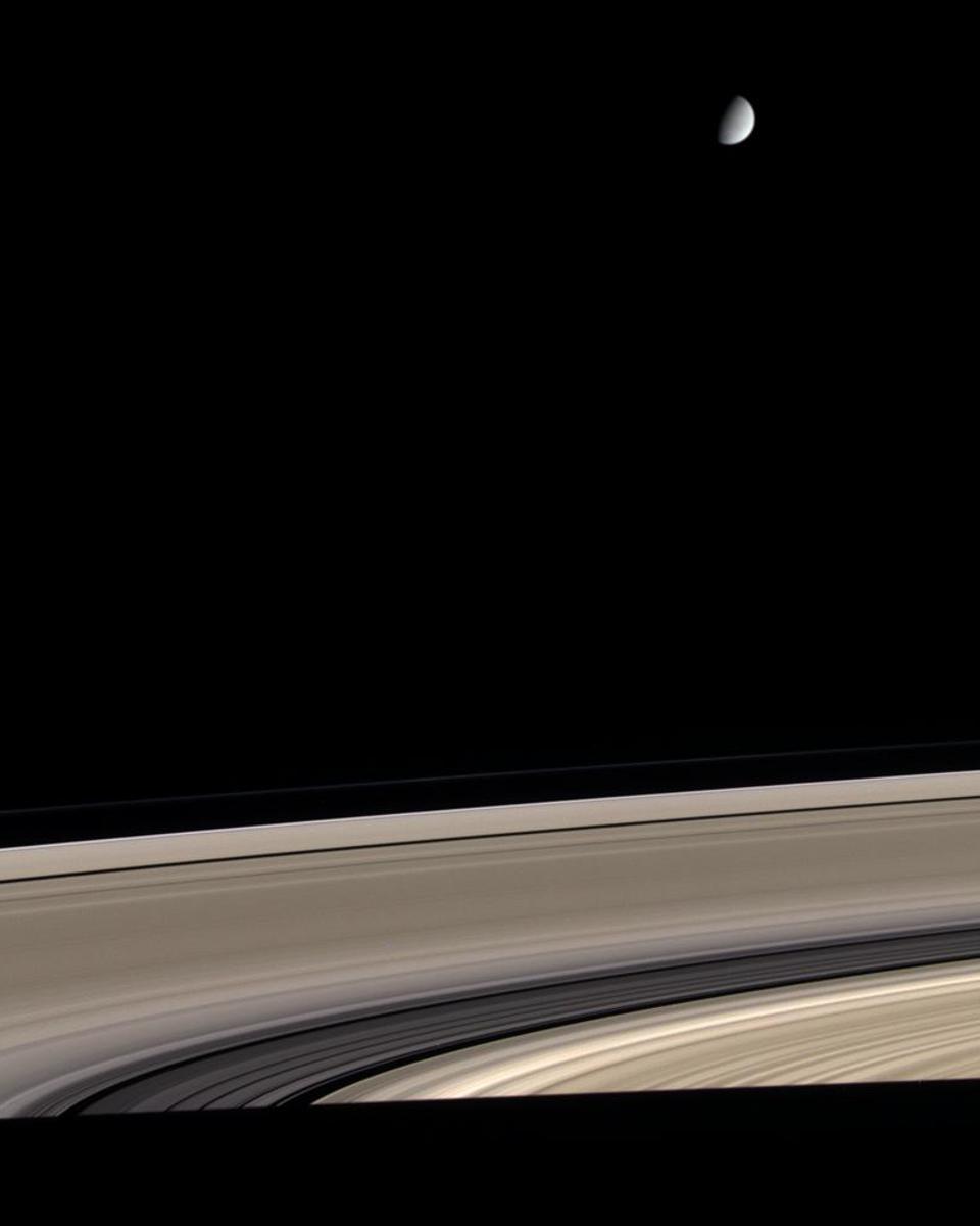 Saturn: Dirty Rings and a Clean Moon