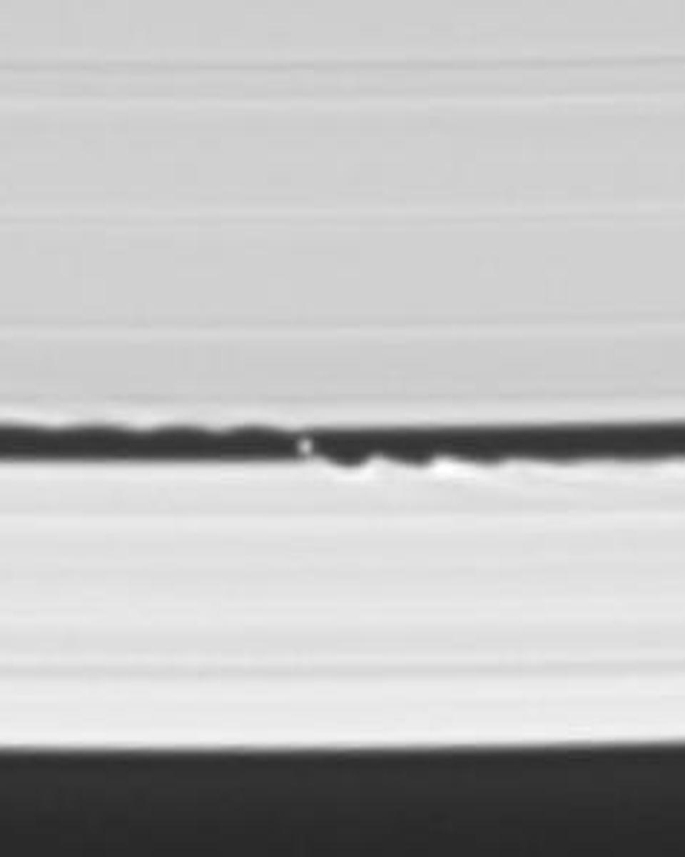A Wave Maker Moon in Saturn's Rings