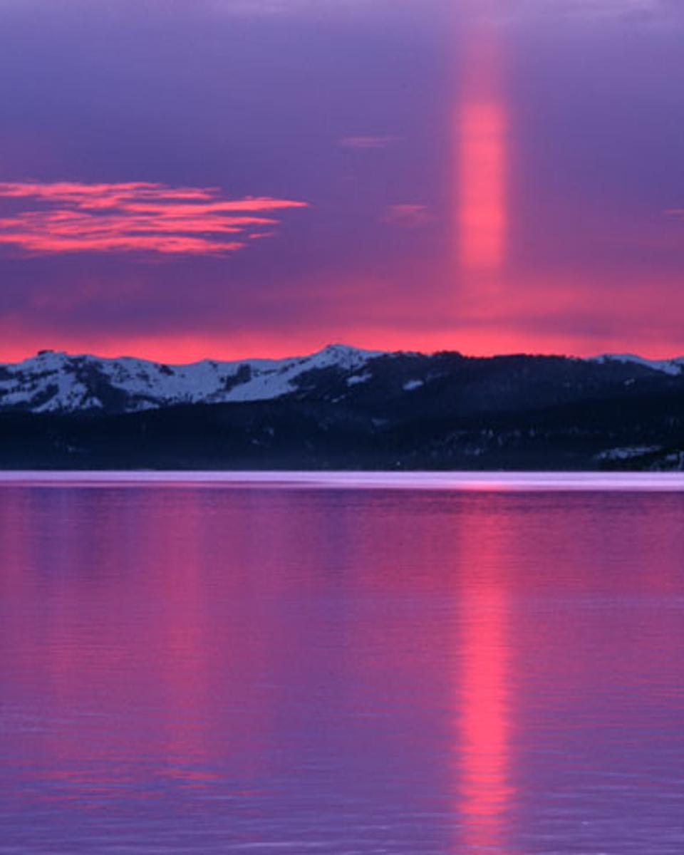 A Sun Pillar in Red and Violet