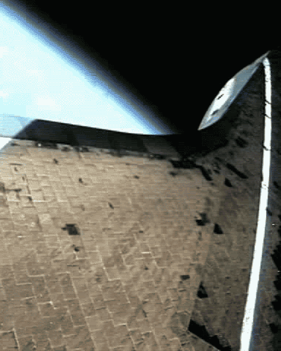 A Space Shuttle Climbs to Orbit