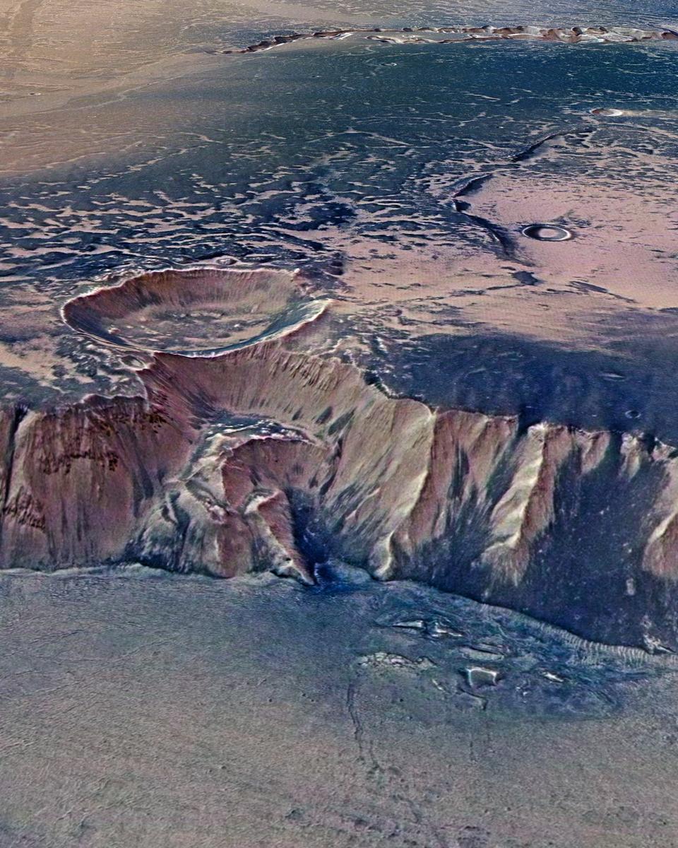 High Cliffs Surrounding Echus Chasma on Mars