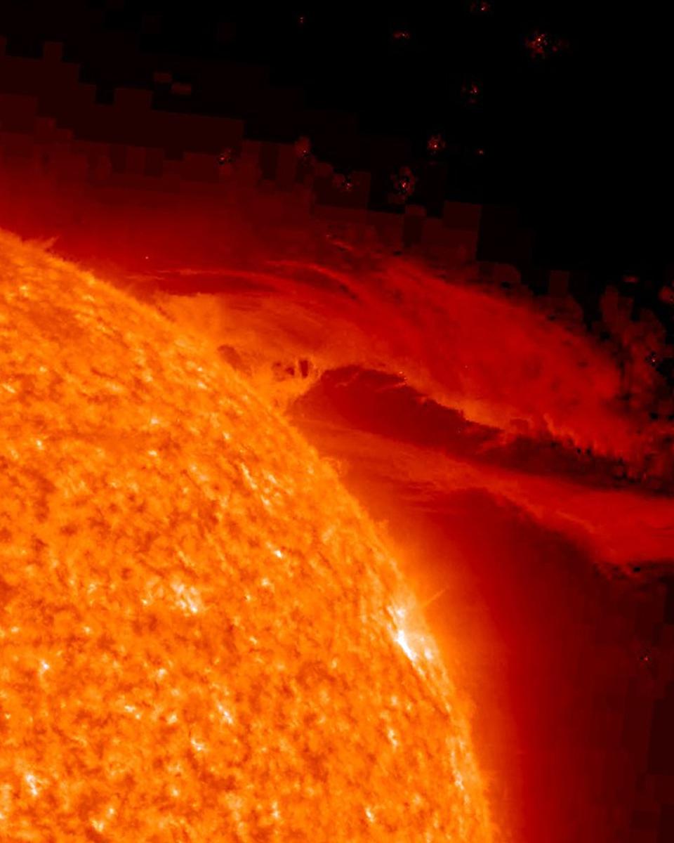 A Solar Prominence Unfurls